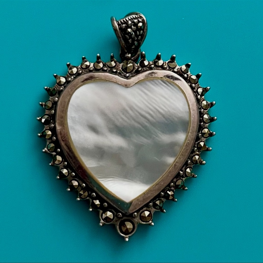 VINTAGE STERLING SILVER HEART SHAPED MOTHER OF PEARL AND MARCASITE HALO PENDANT